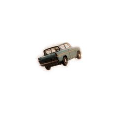 an old blue car is shown in the air on a white background with no clouds