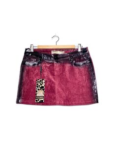 2000s vintage Laminated velvet mini Skirt, y2k mini burgundy Skirt tag size: L brand: 'Stefano' circa: 2000s color: burgundy + black laminate fabric: velvet condition: new with tag (deadstock) measurement: waist: 40.5 cm hips: 45.5 cm length: 47 cm bottom: 35 cm questions about this product? this item is clean and comes from a pet & smoke free building. every vintage piece we stock has been pre-loved + chosen for its unique qualities. fading and wear + tear are a part of each item's past history 2000s Skirt Outfit, 2000s Mini Skirt, 2000s Skirt, Y2k Mini Skirt, Burgundy Skirt, Laminated Fabric, Velvet Mini Skirt, Skirt Y2k, Vintage Skirts