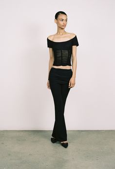 Introducing our Alana Pant in Jet Black. This mid-rise sheer pant flares slightly at the bottom and can be folded over along the waist as a styling detail. The perfect everyday pant.True to size, sculpting fabric.Please refer to the flat lay image for product accuracy. Sheer Pant, Mimi Wade, Sheer Pants, Everyday Pants, Open Neck, Statement Dress, Fitted Tee, Everyday Dresses, Corset Dress