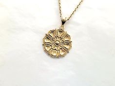 women's and men's buddhist lotus flower necklace pendant 1 made in 14k solid gold or 18k solid gold buddhist lotus flower with exquisite detail is designed as a relief. - model wears a 2.1mm 50cm chain. - free shipping on all orders - designed by carre d'or - made in south korea 14k gold lotus flower pendant necklace 1 weight pendant only 6.71g (±3%) with a 2.1mm 42cm chain 12.67g (±3%) with a 2.4mm 42cm chain 14.54g (±3%) with a 3.0mm 42cm chain 18.29g (±3%) 18k gold lotus flower pendant neckla Spiritual 14k Gold Medallion Jewelry, 14k Gold Jewelry With Flower Charm Pendant, 14k Gold Flower Pendant Jewelry With Charm, 14k Gold Flower Charm Jewelry, 14k Gold Flower Charm Pendant Jewelry, Spiritual 14k Gold Round Pendant Jewelry, Spiritual Yellow Gold Medallion Necklace With Large Pendant, 14k Gold Spiritual Round Pendant Jewelry, Spiritual 14k Gold Round Pendant