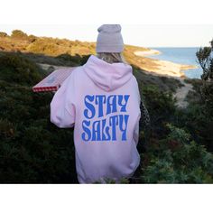 Trendy Hoodie, Trendy Sweatshirt, Beach Hoodie, Stay Salty, Stay Salty Hoodie, Summer Hoodie, Hoodie for Her, Stay Salty Shirt, Hoodie FREE shipping in the US! No order minimum.  ♥ The HOODIE * This is a Gildan 18500 heavy blend adult hooded sweatshirt (unisex).  * Detailed sizing information can be found in the size chart in the photos. * Printed in the USA. ♥ CARE ＊Machine wash cold, inside-out, gentle cycle ＊Wash with mild detergent and similar colors ＊Tumble dry low or hang-dry ＊Do not bleac Casual Pink Hoodie For Outdoor Activities, Outdoor Hooded Sweatshirt With Letter Print, Pink Hoodie With Drawstring For Outdoor Activities, Hooded Hoodie With Letter Print For Outdoor, Pink Hoodie For Outdoor Fall Activities, Pink Cotton Hoodie For Outdoor, Pink Long Sleeve Hoodie For Outdoor, Pink Hooded Hoodie With Letter Print, Cozy Hoodie With Letter Print