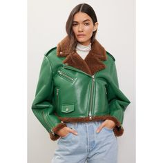 Green faux leather (70% Polyurethane, 30% Polyester/100% Polyester). Jacket. Long sleeves. Collar. Front zipper closure. 20" from shoulder to hemline. Imported. Leather Cropped Jacket With Zipper Closure, Green Zipper Closure Outerwear For Work, Green Outerwear With Zipper For Work, Faux Leather Jacket With Faux Fur Trim For Fall, Fall Faux Leather Jacket With Faux Fur Trim, Trendy Leather Outerwear With Faux Fur Trim, Trendy Leather Cropped Jacket For Winter, Fall Outerwear With Asymmetrical Zip Closure, Fall Cropped Jacket With Zipper Closure