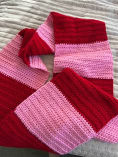 Hand-Crocheted Two-Toned Striped Scarf - Cozy, Stylish, and Perfectly Warm Brighten up chilly days with this stunning hand-crocheted scarf, featuring two beautifully coordinated shades of pink in bold, eye-catching stripes. Designed with both style and warmth in mind, this scarf is the perfect accessory to elevate your winter wardrobe or gift to someone special. Made with care and precision, the scarf's soft texture and modern stripe pattern make it a versatile piece you'll reach for all season Crochet Pink And Red, Crochet Scarf 2 Color, Winter Crochet Scarf, Striped Scarf Crochet, Crochet Scarf Pink, Crochet Scarf Striped, Scarf Crochet Ideas, Scarf Diy Ideas, Winter Crochet Clothes