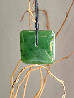 Canadian Jade Square Jade Pendant. Measures approximately 30mm on an adjustable wax cord Comes with or without our handcrafted wooden gift box Handmade Adjustable Rectangular Necklace, Adjustable Rectangular Jewelry Gift, Adjustable Rectangular Jewelry For Gifts, Handmade Square Necklace For Gift, Artisan Jewelry With Adjustable Cord As Gift, Artisan Adjustable Rectangular Necklace, Artisan Rectangular Adjustable Necklace, Minimalist Waxed Cord Jewelry As Gift, Handmade Square Jewelry As Gift