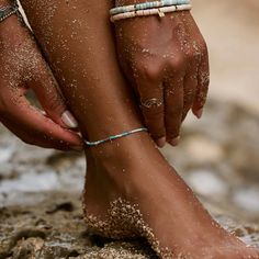 Having perfect style is no small feet—-but our Ventura Stretch Bead Anklet can help make it happen! Available in a turquoise and silver color combo, this slip-on style features delicate heshi beads that’ll have you glimmering from head to toe. Adjustable Turquoise Anklets For Summer, Summer Beach Anklets With Silver Beads, Adjustable Silver Beads Anklet For Summer, Turquoise Beaded Bracelets For Summer, Beaded Anklets For The Beach, Casual Beaded Turquoise Anklets, Casual Turquoise Beaded Anklets, Adjustable Turquoise Strand Anklets, Bohemian Silver Beads Anklets For Beach