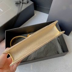 Size: 19cm*11.5cm*4cm It comes with Dust box, Care manual, Tag, and Paper bag. Luxury Phone Bag With Dust Bag For Daily Use, Luxury Pouch Baguette Bag With Phone Pocket, Luxury Baguette Mobile Phone Bag For Daily Use, Luxury Rectangular Baguette Bag With Dust Bag, Designer Handheld Clutch For Daily Use, Luxury Rectangular Baguette Bag With Top Carry Handle, Handheld Shoulder Bag With Original Box As Gift, Luxury Mobile Phone Bag In Rectangular Case, High-end Box Bag With Gold-tone Hardware