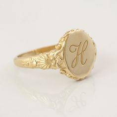 This vintage style sea-themed signet ring, featuring beautiful little shells and ocean-inspired fluorishes all around the center which displays your personal monogram or initials.  This ring can be customized with any letter or word (provided it fits) and is made in solid gold. This ring can be made for men or women and in your preferred size or color of gold. A phrase or letter may be written on the inside, too! All designs are modelled and sent to you for approval before casting the final desi Monogram Signet Ring, Woman Signet Ring, Signet Ring Initials, Signet Rings Women Vintage, Initial Ring Gold, Signet Ring Vintage, Signet Ring Women, Lily Ring, Custom Signet Ring