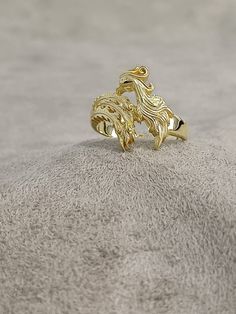 Gold Phoenix Fire Bird Ring, 10k 14k 18k Solid Gold Handmade Jewelry, Fantasy Ring for Women, Spiritual Fire Bird Ring, Gold Gift for Her ★Item Details * Gender : Female / Male  * Material: 10K - 14K - 18K Gold * Ring Diameter: 1.9cm (0.8 inches)  * Ring Weight:  10K: 7.50 - 8.00 Gr 14K: 8.50 - 9.00 Gr 18K: 9.50 - 10.00 Gr * All our products are handmade and weights may vary   (-) 1,00 gram  * Ring Size: 5 US to 15 US - ( Contact me if you're expecting to buy another ring size ) * Visit our shop for more items https://www.etsy.com/shop/7SAtelier  ✔ Ready to Ship in 3-5 Business Days ✔ Free shipping worldwide! ✔ The product will be sent in a bubble-wrapped handmade wooden box to avoid any damage during shipping. ✔ Visit our store, browse our other collections, and find the perfect piece you Fnatasy Rings, Fire Jewelry Ring, Fox Jewelry Ring, Fox Ring Gold, Phoenix Fire Bird, Phoenix Ring, Women Spiritual, Phoenix Fire, Phoenix Jewelry