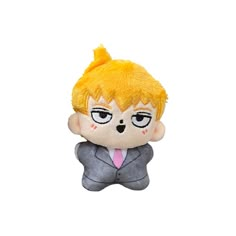 an image of a stuffed doll with big eyes and yellow hair on it's head