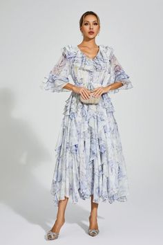 Chiffon V-neck Ruched Dress, Flowy Floral Print V-neck Dress, Elegant Flowy V-neck Dress With Floral Print, Elegant V-neck Maxi Dress For Garden Party, Chiffon Ruched Dress For Garden Party, Elegant Tiered V-neck Dress For Spring, Chic Ruched V-neck Dress For Spring, Ruched Maxi Floral Dress For Garden Party, Ruched Floral Maxi Dress For Garden Party