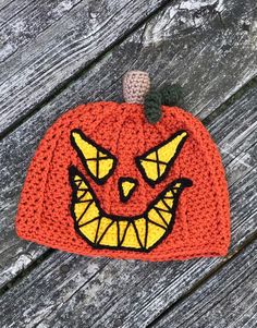 "This seriously spooky Jack-O-Lantern hat is sure to delight on a cold Halloween night! This haunting hat is all hand crocheted and embroidered from my original pattern. Please select desired size. Hat sizing info: 0-3 months: 15\" circumference 3-6 months: 17\" circumference 6-12 months: 18\" circumference 12 months-2T: 19\" circumference 3T-4T: 20\" circumference 4T-tween: 21\" circumference adult small: 22\" circumference adult medium: 23\" circumference adult large: 24\" circumference This h Halloween Costume Cap, Spooky Hats For Halloween Costume Party, Themed Halloween Cap, Playful Halloween Costume Cap, Themed Halloween Costume Hats, Fun Halloween Hats, One Size Fits Most, Fun Halloween Hats One Size Fits Most, Themed Halloween Hat, One Size Fits Most, Handmade Themed Halloween Costume Hats And Headpieces