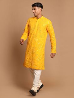 SHRESTHA BY VASTRAMAY Men's Yellow Embroidered Kurta Pyjama Set Look dapper in this ethnic set featuring a yellow kurta with intricate embroidery and a comfortable pyjama. Made with high-quality fabric, this set is perfect for festive occasions or a touch of tradition in your everyday wear. Key Features Embroidered kurta Comfortable pyjama Yellow color Specifications: Sleeve Length - Long Sleeves Top Shape Straight Top Hemline - Straight Top Length - Knee Length Neck Mandarin collar Top- Pattern Navratri Long Sleeve Sherwani With Gota Work, Navratri Sherwani With Gota Work And Long Sleeves, Festival Long Sleeve Sherwani With Gota Work, Semi-stitched Yellow Kurta For Transitional Season, Traditional Long Sleeve Sherwani With Gota Work, Yellow Sherwani With Gota Work Straight Kurta, Yellow Sherwani With Gota Work And Straight Kurta Shape, Yellow Sherwani With Gota Work In Straight Kurta Style, Yellow Sherwani With Gota Work