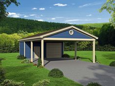 a blue and tan garage sitting on top of a lush green field