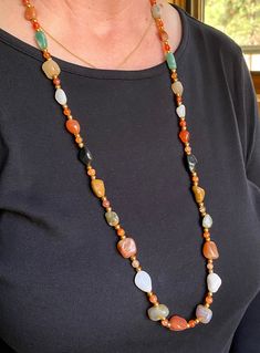 Timeless natural agate gemstone necklace that is at least 50 years old. Agates separated by small agate and gold metal beads to add the sparkle. Gold Agate Beaded Necklace With Polished Beads, Gold Agate Beaded Necklace With Natural Stones, Gold Long Beaded Necklaces With Stones, Gold Agate Beaded Necklace With Stones, Gold Agate Beaded Necklaces With Stones, Gold Carnelian Gemstone Beaded Necklace, Gold Carnelian Beaded Necklace With Gemstone, Gold Single Strand Agate Necklace, Gold Agate Single Strand Beaded Necklace