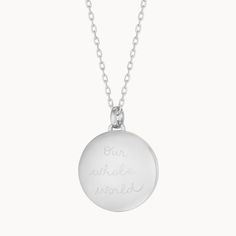 Our weighted Personalized Locket Necklace Sterling Silver can be hand-engraved on the inside and out, keeping your loved ones and special memories close to heart.925 Sterling SilverLoquet charm: 0.8 diameterSecure clasp fasteningCharms are removable from this chain and can be worn on all Merci Maman chain lengthsHand-engraved in our Paris studioSent with love in a complimentary gift boxAny slight variations in lettering depth, spacing and alignment from the examples shown are part of the aesthetic and originality of the piece Anniversary White Gold Locket Necklace, White Gold Locket Necklace For Anniversary, Engraved Heart Pendant Necklace With Meaningful Style, Meaningful Engraved Heart Pendant Necklace, Engraved Heart Pendant Jewelry For Keepsake, Engraved Heart Pendant Jewelry Keepsake, Sterling Silver Keepsake Locket Necklace With Round Pendant, Sterling Silver Keepsake Locket Necklace, Engraved Stainless Steel Heart Pendant Jewelry