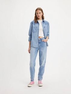 Moms have been coming through with iconic looks since day one, and their late-80s penchant for comfortable, high-waisted jeans is no exception. An elevated take on the timeless Mom jeans, these '80s Mom jeans are fitted with a high rise that's more relaxed through your thigh and calf and tapers at the ankle. A vintage-inspired fit updated with a flattering high waist Tapered leg for tailored style Front is slightly pitched forward, a vintage-inspired detail We made this garment with TENCEL™ Lyoc 80s Mom, Levis Mom Jeans, Levis Outfit, Tailored Style, Iconic Looks, Late 80s, Jeans Mom, Waist Jeans, Tapered Legs