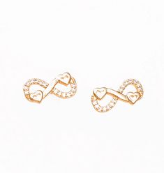 These elegant Infinity Heart Earrings for Women are crafted from highest quality materials and feature an infinity symbol with two hearts, representing eternal love and connection. Perfect for expressing your love and devotion. Materials: tarnish resistant gold electroplated steel, and cubic zirconia stones (Lead, Nickel and Chromium free) Product Dimension: 15mm width x 7mm height. Package contents: one earring set in a jewelry box. Photo may have been enlarged and/or enhanced. SKU: 985192 Love And Connection, Helvetica Neue, Box Photo, Infinity Heart, Free Product, Infinity Symbol, Two Hearts, Eternal Love, Heart Earrings