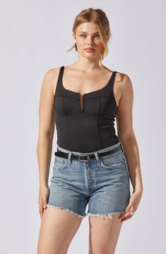 U-bar sleeveless bodysuit Snap closure Partially lined (bust only) Self: 75% Nylon, 25% Elastane / Lining: 95% Polyester, 5% Elastane Hand wash cold, do not bleach Line dry, iron low if needed Do not tumble dry Style #AT18444 Summer Nylon Bodysuit With Tank Straps, Chic Black Polyamide Bodysuit, Polyamide Bodysuit For Night Out, Spring Nylon Bodysuit With Built-in Bra, High Cut Nylon Bodysuit With Lined Body, High-cut Nylon Bodysuit With Lined Body, Fitted Nylon Tank Top, Chic Lined Tank Top For Night Out, Fitted Bodysuit With Tank Straps For Party