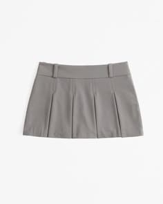 Our new mid rise mini skort in our everyday menswear fabric, featuring a shorts lining underneath for comfort, stitched-down pleating details, belt loops and functional side zipper for a secure fit. Debate Outfits, Fall Wishlist, Female Features, Pleaded Skirt, Clothes Wishlist, Grey Mini Skirt, College Fits, Women's Bottoms, Going Out Outfits