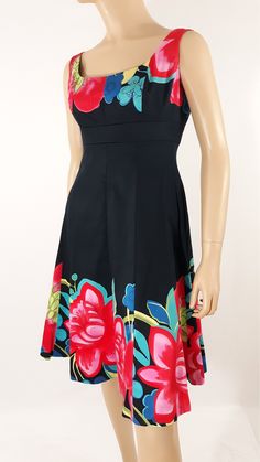 "Women's Dress Summer Classic Colorful Floral Black Sleeveless Fitted Bodice Excellent Condition Vintage Designer by NINE WEST Size 6 Gorgeous head turning dress with colorful floral pattern around bust and hymn line in pinks red yellow green and blue, on solid black dress.  Sleeveless, scoop neck, fitted bodice with darts, zipper back...super cute! Classic chic feminine. Fitted bodice and flared out circular skirt for dramatic silhouette, sweetheart neckline, back zipper, front and back fitted Multicolor Sleeveless Lined Dresses, Multicolor Fit And Flare Sleeveless Dresses, Multicolor Skirted Dress With Floral Print, Multicolor Skirted Dress For Party, Multicolor Stretch A-line Dress, Head Turning Dress, 80s Dress, Classic Chic, Vintage Designer