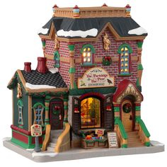 Porcelain lighted building for a Lemax display. Designed to look like a brick building decorated for Christmas with wreaths and garlands. There's snow on the roof and on the sidewalk. Fall Village, Lemax Village, Lemax Christmas Village, Lemax Christmas, Bread Shop, Toys For Tots, Backyard Flowers, Holiday Village, Wood Fired Oven