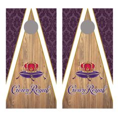 two cornhole game boards with crown royal on the front and purple, gold, and white trim