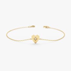 Say it with your heart first. This captivating bracelet features a dainty heart-shaped charm, meticulously crafted from 14k solid gold (available in yellow, white, or rose gold depending on your offering). A sparkling diamond is prong-set in the center of the heart, creating a design that is both elegant and symbolic. - Handmade - Solid Gold - Natural Diamonds  - G Color, SI Quality Diamonds - The Dimension of the Heart: 7 mm - Total Diamond Carat Weight: 0.01 ctw 🛠 Your Sarah Elise piece is handcrafted with care! Ready-to-ship items go out within 3 business days. Made-to-order pieces typically take 7-10 business days to create. If you need something sooner, please contact us - we'll see if we can make it happen! For estimated shipping dates and tracking, check your Etsy account under 'Or Memory Ring, Gold Diamond Bracelet, Bracelet Heart, Bracelets Gold Diamond, Sparkling Diamond, Rose Yellow, Initial Jewelry, Diamond Carat, Gold Wedding Rings