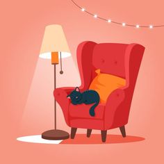 a red chair with a black cat sleeping on top of it next to a lamp