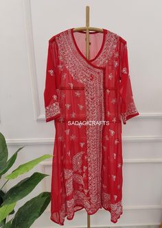 DESCRIPTION ▪ Kurti Fabric: Angarkha ▪ Kurti Length: 44-46 Inches ▪ Style: Angarkha Kurti ▪ Occasions: Party Wear, Office Wear, Festive Wear ▪ Garment Care: Hand Wash Only ▪ Price Includes: 1x Kurti with inner Traditional V-neck Semi-stitched Salwar Kameez, Traditional Red Kurta With Dabka, Red Dabka Embroidered Georgette Kurta, Red Georgette Kurta With Dabka Detailing, Red Georgette Kurta With Dabka, Traditional Red Dabka Kurta, Festive V-neck Self Design Kurta, Red Traditional Wear With Dabka On Georgette, Festive Fitted Kaftan With Zari Work