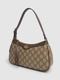 Height: 15cm Width: 26cm Depth: 6cm. Handle drop: 18cm. Gucci Cosmogonie. Adjustable leather strap. Top zip closure. Leather details. All over GG pattern placement may vary Gucci Cosmogonie, Versace Brand, Ski Accessories, Pretty Bags, Strap Top, Sports Accessories, Flat Espadrilles, Canvas Shoulder Bag, Swim Accessories