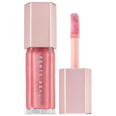 An ultimate, gotta-have-it lip gloss with explosive shine that feels as good as it looks.Highlighted Ingredients: - Shea Butter: Conditions skin. Ingredient Callouts: Free of parabens and phthalates. This product is also cruelty-free.What Else You Need to Know: This universal lip luminizer delivers explosive shine in six shades that flatter all skin tones. One swipe of Gloss Bomb’s XXL wand leaves lips looking instantly fuller and smoother. The non-sticky formula is super shiny, and has an addic Lip Gloss Sephora, Alat Makeup, Beauty Make-up, Luminizer, Eyeshadow Tutorial, Beauty Inside, Benefit Cosmetics, Fenty Beauty, Pink Lips