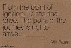 a piece of cardboard with a quote on it that says, from the point of ignition to the final drive the point of the journey is not to arrive