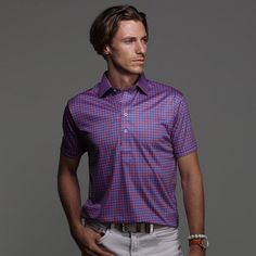 The versatile Semi-Spread Collar Polo. Woven for comfort and designed for style. This shirt pairs a formal semi spread dress collar with an extra comfortable, 4-way stretch, short-sleeved polo. The semi-spread collar has all the benefits of our ever popular English spread collar with a streamlined size. This Tribeca Gingham pattern provides the stylistic versatility to keep you looking sharp from your downtown client meeting to your uptown dinner date. Get all the upside of a formal collar witho Fitted Polo Collar Shirt For Semi-formal Occasions, Fitted Polo Shirt With Spread Collar For Summer, Classic Fitted Golf Shirt, Fitted Spring Polo Shirt, Formal Fitted Polo Shirt With Placket, Fitted Polo Shirt With Short Sleeves, Formal Fitted Polo Shirt With Collared Neckline, Fitted Short Sleeve Polo Shirt For Spring, Fitted Polo Shirt For Summer Workwear