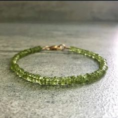 New Gorgeous!! Genuine Peridot Bracelet In Gold Plating Over Sterling Silver. Bracelet Has An Extension On The Clasp. Perfect For Yourself Or As A Gift. Very Shiny And Brilliant!! Very Unique And Different! Suitable For Most Ages. Suitable For All Occasions. Perfect Bracelet For Layering. Nwt Green Peridot Stackable Jewelry, Stackable Green Peridot Jewelry, Green Gemstone Rondelle Beaded Bracelets, Green Faceted Spiritual Bracelets, Spiritual Green Faceted Bracelets, Green Gemstone Beads Bangle Bracelet, Faceted Green Beaded Bracelets As Gift, Green Peridot Round Bracelets, Green Rondelle Bracelets For Jewelry Making