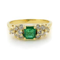 Sweet and rather petite, a rich green emerald-cut green emerald weighing 0.60ct is surrounded and flanked by 12 bright and sparkling round brilliant-cut diamonds weighing 0.36ct. This delightful estate jewel is presented in rich and sturdy 14K yellow gold. Ring size 5.25. Total weight: 2.91 grams. Comes with a presentable gift box. Rachel Koen Green Emerald 0.60ctw Diamond 0.36ctw Ring 14K Yellow Gold Size 5.25 Description Sweet and rather petite, a rich green emerald-cut green emerald weighing Round Diamonds Wedding Band, Star Of David Pendant, Emerald Diamond Ring, Rich Green, White Gold Engagement, Pearl Diamond, Yellow Gold Ring, Green Emerald, Diamond Pendant Necklace