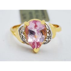 Metal Purity: 14k Yellow Gold Condition: New With Tag Gemstone Type: 1 Genuine Pink Topaz - 2.86 Carats Pink Sapphire Grades: Hue . . . Pink Tone . . . Medium Saturation . . . Vivid Cut . . . Very Good Some Minor Inclusions 6 Genuine Diamonds - 0.015 Carats Each Diamonds Grades: Clarity Grade . . . Si2 Color Clarity . . . Hi Dimensions: 9 Mm X 6 Mm - Gemstone Measurements Ring Size: 6.5 (Free Resizing Service If Needed) Beautiful Gold Rings, Twisted Metal, Diamonds Ring, Pink Topaz, Sterling Silver Flowers, 14k Gold Ring, Pink Tone, Pretty Earrings, Love Ring