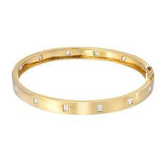 A classic! This beautiful 14k gold bracelet is studded with baguette diamonds all the way around. Use it as the starting point to an amazing stack of bracelets. This bangle comes as standard in a 6.5" size - other sizes are available to order. SKU: BG0100177 Total diamond weight: 0.80ct 14k gold - available to order in rose, white and yellow. Classic Gold Bangle With Baguette Diamonds, Modern Baguette Cut Diamond Bangle, Modern Diamond Bangle With Baguette Cut, Yellow Gold Diamond Bangle With Baguette Diamonds, Yellow Gold Diamond Bracelet With Baguette Cut, Yellow Gold Baguette Cut Diamond Bracelet, Anniversary Baguette Cut Diamond Bangle, Classic Bangle With Baguette Diamonds Cut, Yellow Gold Diamond Bracelet With Baguette Diamonds