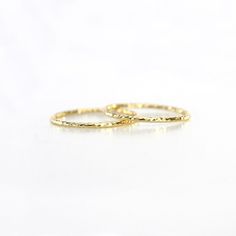 Prasanna Ring Delicate 14k Gold Band, Elegant Gold Bands With Tarnish Resistance, Elegant Gold Bands Tarnish Resistant, Elegant Gold Tarnish Resistant Bands, Elegant Gold Tarnish-resistant Bands, Timeless Gold Stackable Rings With Simple Design, Elegant Hammered Rings, Elegant Adjustable Gold Band, Elegant Hammered Stackable Rings