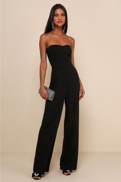 From cocktail hours to refind affairsâ€”No matter the occasion, the Lulus Edith Black Strapless Wide-Leg Jumpsuit is sure to impress! Stretchy ponte knit shapes a strapless, princess-seamed bodice with an elasticized back for fit. A high, fitted waist tops wide pant legs that fall to full-length hems. Hidden back zipper/clasp. Fit: This garment fits true to size. Length: Floor length. Size medium measures 53.75" from top to bottom. Inseam: 32.00 Front Rise: 13.25 Bust: Works best for A to C cup sizes - consider sizing up for fuller bust. Waist: Fitted - stretchy fabric allows custom fit. Hip: Fitted - stretchy fabric allows room for hips. Undergarments: May be worn with a strapless bra, adhesive bra, petals, or no bra. Fabric: Fabric is very stretchy. Fully lined. Shell: 95% Polyester, 5% Relax Pants, Adhesive Bra, Cup Sizes, C Cup, Wide Pants, Strapless Bra, Wide Leg Jumpsuit, Stretchy Fabric, Custom Fit