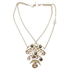 Chanel Brand New Gold CC Moon Crystal Faux Pearl Chain Necklace *Marked 19 *Made in France *Comes with original box, dustbag, tag, ribbon, ribbon and tag *Brand New -It is approximately 16″ long. -The CC pendant is approximately 2.5″ x 3.25″. 13089-7149 Chanel N 5, Chanel Brand, Pearl Chain Necklace, Moon Crystal, Chanel Vintage, Pearl Chain, Karl Lagerfeld, Made In France, Faux Pearl