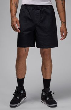 Lightweight and ready for whatever, these shorts are made from a durable woven cotton that's breathable enough to wear all year long. Elastic/drawstring waist Side pockets; back welt pocket 100% cotton Machine wash, tumble dry Imported Nike Relaxed Fit Shorts With Elastic Waistband, Casual Cotton Shorts With Short Inseam, Black Outdoor Shorts For Spring, Nike Cotton Bottoms With Relaxed Fit, Cotton Cargo Shorts With Elastic Waistband For Spring, Black Cotton Shorts With Pockets, Spring Cotton Cargo Shorts With Elastic Waistband, Nike Relaxed Fit Shorts, Casual Cotton Cargo Shorts With Short Inseam