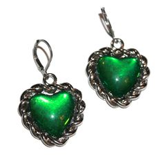 "Green Chain Heart Earrings - these measure 1.75\" long including the hooks. They are a tad heavy, so best not for super sensitive ears. I have sensitive ears and I could wear them for an event, but not a full day. The hooks are extra secure and will work with gauges. I love this color green. It has the look of a mood ring but it does not change colors." Trendy Nickel-free Metal Heart Earrings, Green Nickel-free Heart Earrings As Gift, Green Heart Earrings For Valentine's Day Party, Nickel Free Green Heart Earrings, Nickel-free Green Heart Earrings, Green Heart-shaped Hypoallergenic Jewelry, Hypoallergenic Green Heart Jewelry, Green Pierced Heart Earrings As Gift, Green Heart-shaped Earrings For Valentine's Day