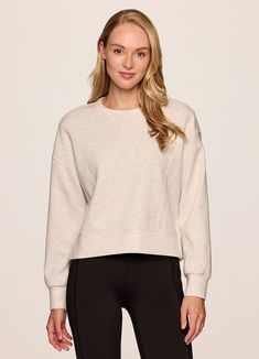 Our In The Studio Cropped Pullover combines a classic crewneck design and super soft, trendy scuba fabric for a lightweight pullover you can take from studio to street. A slightly cropped length is complemented by a relaxed fit, dropped shoulders and sporty seaming detail that allow for easy styling and layering. Throw this cute crop sweatshirt over a sports bra for a workout or pair it with jeans for a casual-cute look. Cropped Pullover, Scuba Fabric, Crewneck Design, A Workout, In The Studio, Crop Sweatshirt, The Studio, Drop Shoulder, Layering