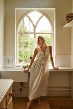 A family business, If Only If is obsessed with the classic nightgown from its timeless silhouette to the most special details. Crafted in 100% natural materials, these nightdresses are romantic, practical, and become even softer with every wash. Crafted from pure silk, the Emily Silk Nightdress has a sumptuously elegant cut, and features lace trim on the bodice. It does not get more luxurious. Product Details 100% silk satin. Care Instructions Machine wash warm with a gentle detergent. Lay flat Feminine Silk Nightgown For Loungewear, Maxi Length Nightgown For Wedding Night In Summer, Cream Elegant Sleep Dress, Cream Night Dresses, Elegant Cream Night Dress, Elegant Cream Dress For Night, Elegant Cream Dresses For Night Events, Maxi Length Nightgown For Wedding Night, Elegant Cream Sleepwear For Home