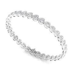 Go ahead, wear your heart on your sleeve with this unique rendition of a classic tennis bracelet. Diamond Heart Cut Tennis Bracelet For Anniversary, Diamond Tennis Bracelet With Heart Cut For Anniversary, White Gold Heart Cut Tennis Bracelet For Anniversary, Classic White Gold Diamond Heart Bracelet, Heart Cut Diamond Tennis Bracelet For Anniversary, Heart Cut Tennis Bracelet With Diamond Accents For Anniversary, Anniversary Heart Cut Tennis Bracelet With Diamond Accents, Anniversary Tennis Bracelet With Diamond Accents, Classic Diamond Heart Bracelet In White Gold