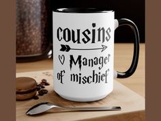 a white coffee mug with the words'anette is manager of mischeert'on it