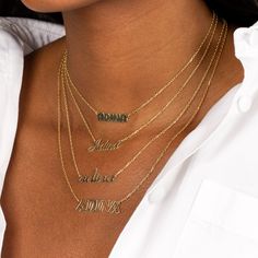 Flaunt the carefree side of your personal style with Adina's Flat Bubble Name Necklace, featuring a flattened, bubble-font nameplate that dangles from a slim chain. Customize this beauty with the word or name of your choosing. It makes quite the statement on its own but really brings on the "wow" factor when you wear it with another personalized necklace and a couple of chokers. Product Details Made from Sterling Silver Gold Plated Nameplate Size: 6 MM X 22 MM Length: 17"+ 2" This Product Requir Name Plates Necklace Gold, Name Plate Chain, Nameplate Necklace Gold, Bubble Font, Customized Necklace, Necklace Fine Jewelry, Couple Name, Necklace Stack, Necklace Name