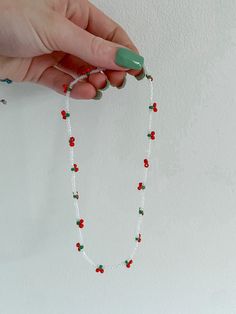 seed bead cherry necklace Trendy White Faceted Bead Necklaces, Trendy White Necklaces With Faceted Beads, Trendy White Necklace With Faceted Beads, Casual Red Beaded Chain Jewelry, Trendy Red Beaded Necklace, Dainty Red Beaded Necklaces With Round Beads, Trendy Red Round Bead Necklaces, Trendy Red Necklaces With Round Beads, Dainty Red Beaded Necklace With Round Beads