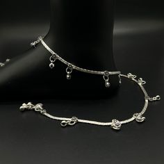 Name of product:  Pure Silver Light Weight Anklet / Silver Payal Weight: 34.2 grams. Length: 27.8 centimeter  FREE EXPRESS SHIPPING -----Feedback::- A satisfied customer is our top priority and your feedback forms the backbone of our success. Don't forget to give positive feedback along with good ratings. Thank You Elegant Adjustable Anklets For Festivals, Elegant Metal Anklet For Festivals, Silver Metal Ankle Strap Anklet, Silver Ankle Strap Anklets For Festival, Elegant Adjustable Anklets For Festive Occasions, Elegant Adjustable Festive Anklets, Elegant Silver Anklets With Latkans, Adjustable Silver Ankle Wrap Anklet, Silver Ankle Wrap Anklets For Festival