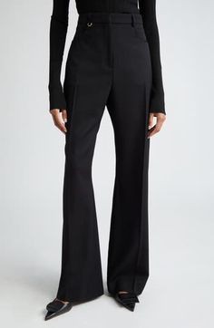 Crisp creases further the polished look of these high-rise wool pants designed in a flare-leg silhouette. 34" inseam; 24" leg opening; 14 1/2" front rise; 17" back rise (size 42) Zip fly with hook-and-bar closure Front scoop pockets 100% wool Dry clean Imported Designer Clothing Tailored Black Flare Wide Leg Pants, Elegant Black High-waisted Flare Pants, Elegant Black High-waisted Flares, Elegant Black Flares For Evening, Black Elegant Evening Flares, Elegant Black Evening Flares, Classic Flare Formal Bottoms, Elegant Wide Leg Pants For Workwear With Structured Boning, Classic Flare Bottoms For Formal Occasions